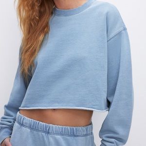 NWOT Good American Jeanius cropped sweatshirt in the color Indigo